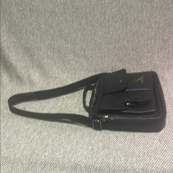 Sleek Black Messenger Bag with Adjustable Strap and Structured Design - Picture 15 of 16